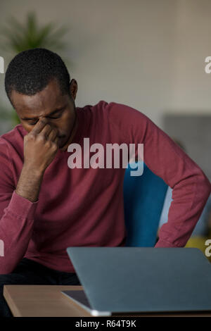 Close-up Of Person Typing On Laptop At startup office. Stock Photo