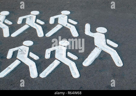 Leadership concept. White silhouettes of people. The leader leads an endless stream of people. For social and business themes. Go ahead Stock Photo