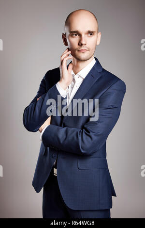 Pensive Man in Suit Stock Photo