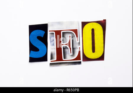 A word writing text showing concept of SEO made of different magazine newspaper letter for Business case on the white background with copy space Stock Photo