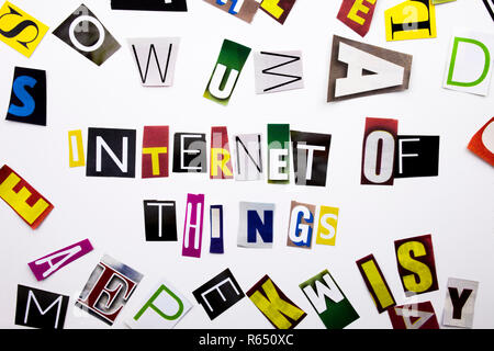 A word writing text showing concept of Internet Of Things made of different magazine newspaper letter for Business case on the white background with copy space Stock Photo
