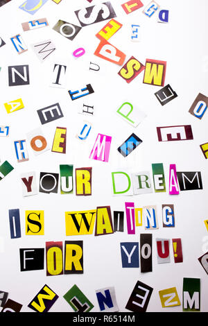 A word writing text showing concept of Your Dream Is Waiting For You made of different magazine newspaper letter for Business case on the white background with copy space Stock Photo