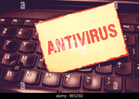 Writing note showing Antivirus. Business photo showcasing software designed to detect and destroy computer viruses Blank Bordered Notepad Reminding In Stock Photo