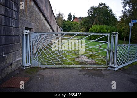 1930s Art Deco steel gates and detail of the Menai Suspension Bridge, Bangor, Gwynedd, Wales, UK Stock Photo