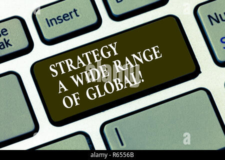 Handwriting text Strategy A Wide Range Of Global. Concept meaning Worldwide communications strategies Keyboard key Intention to create computer messag Stock Photo