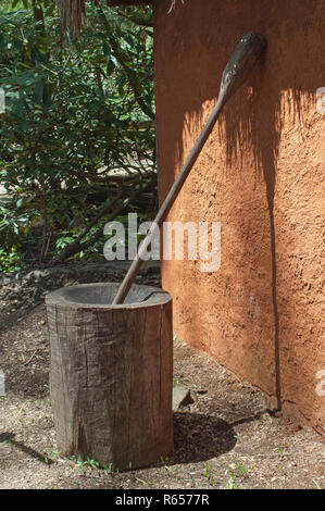 Cherokee wooden mortar and pestle for grinding corn, Oconaluftee Village, Qualla Reservation, North Carolina. Digital photograph Stock Photo