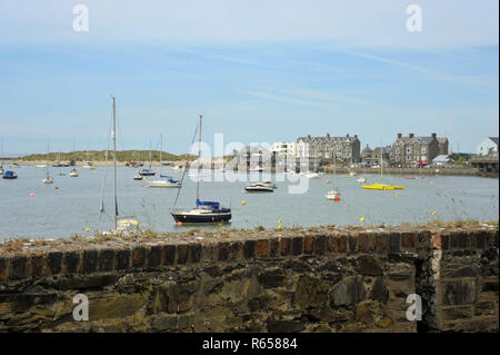 Barmouth town and harbour on the estuary of the river Mawddach and Cardigan Bay, the marina and quay in Gwynedd, North Wales, UK. Stock Photo