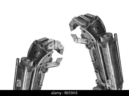 Hand of Robot sculpture made from scrap metal isolated Stock Photo