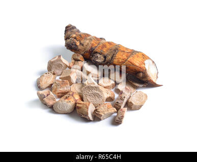 Dried medicinal herbs raw materials isolated on white. Root of Acorus calamus, also called sweet flag or calamus. Stock Photo