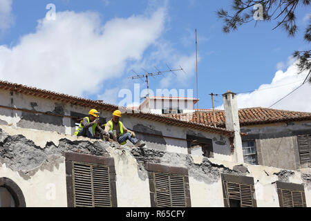 Construction work on a house in the old town of Funchal Stock Photo