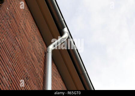 rain gutter with downpipe Stock Photo