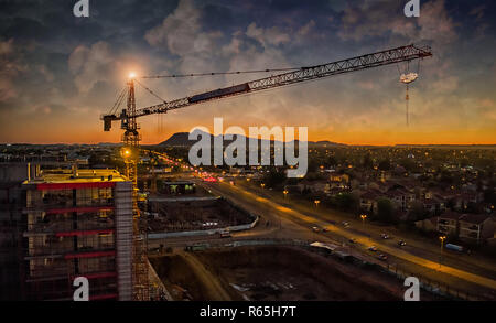 Aerial of crane sunset Stock Photo