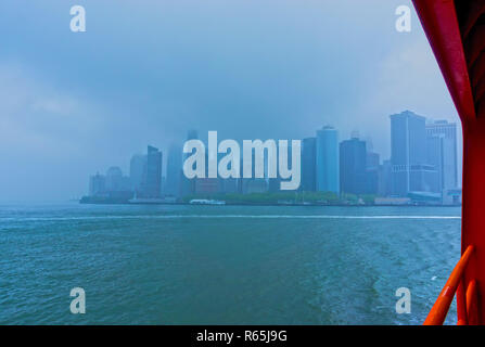 New York City with Ferries and Planes from Harbor Stock Photo