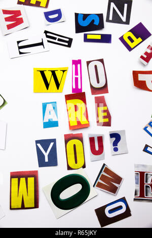 A word writing text showing concept of Who Are You made of different magazine newspaper letter for Business case on the white background with copy space Stock Photo