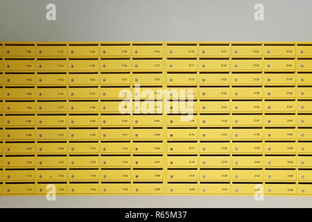 Yellow Mail boxes in the entrance of a building
