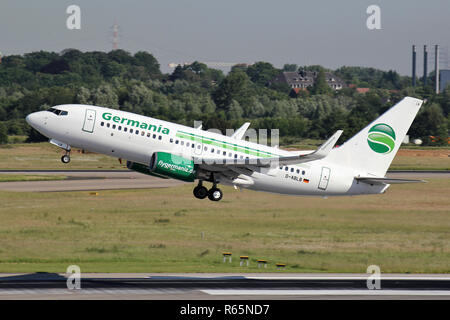 German Germania Boeing 737-700 with registration D-ABLB just airborne at Dusseldorf Airport. Stock Photo