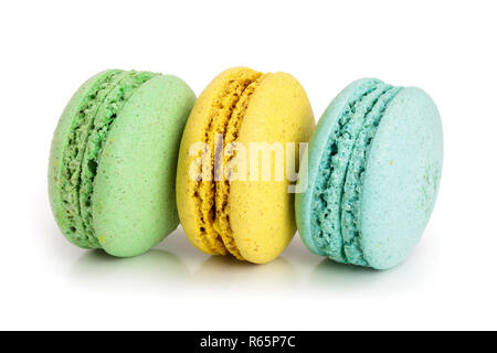 three macaroons isolated on white background closeup Stock Photo