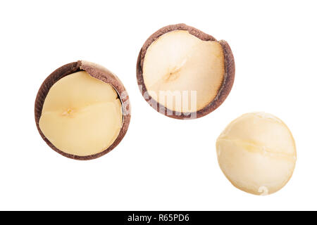 Shelled macadamia nuts isolated on white background. Top view. Flat lay pattern Stock Photo