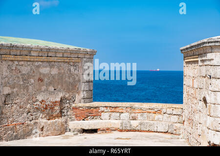 View of an ocean freighter from Morro Castle in Havana Cuba, Stock Photo