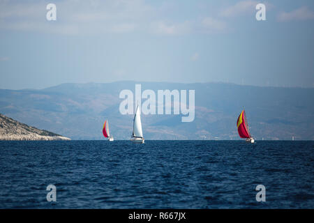 Sailing boats during yacht regatta in the Aegean Sea, Greece. Stock Photo