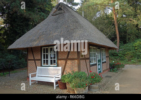 small thatched roof timbered house in hamburg Stock Photo