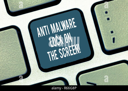 Text sign showing Anti Malware Lock On The Screen. Conceptual photo Security safety against malware hacking Keyboard key Intention to create computer  Stock Photo