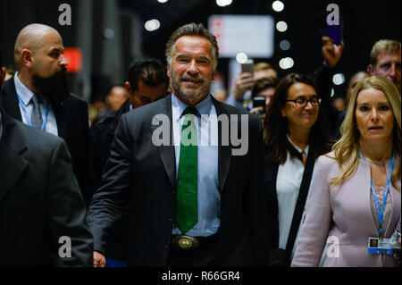 Austrian-American actor and former governor of California, Arnold Schwarzenegger seen walking as he changes rooms during the COP24 UN Climate Change Conference 2018. Stock Photo