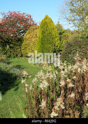 One of the demonstration gardens in autumn afternoon sunlight at Geoff Hamilton's Barnsdale Gardens, Rutland, England Stock Photo