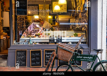 A butchers bike outside of a traditional butchers shop in Aylsham