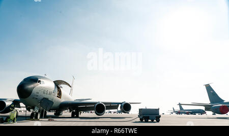 A 28th Expeditionary Aerial Refueling Squadron KC-135 Stratotanker is parked on the flight line prior to a preflight check on Al Udeid Air Base, Qatar, Nov. 29, 2018. The 28th EARS empowers the fight against ISIS by providing mission extending aerial refueling services to U.S. and Coalition forces conducting operations in Operation Inherent Resolve's area of responsibility. (U.S. Air Force photo by Staff Sgt. James Cason) Stock Photo