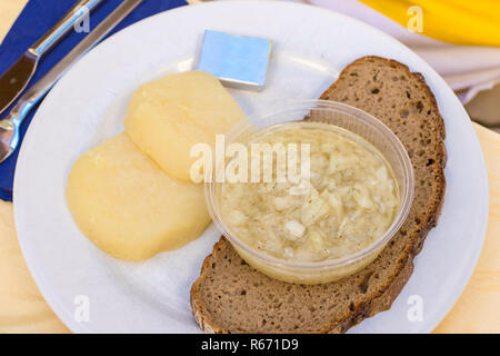sour milk cheese with onion marinade Stock Photo