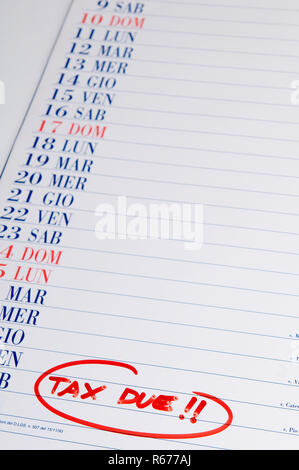 a calendar with the date on which the payment of the fees is due Stock Photo