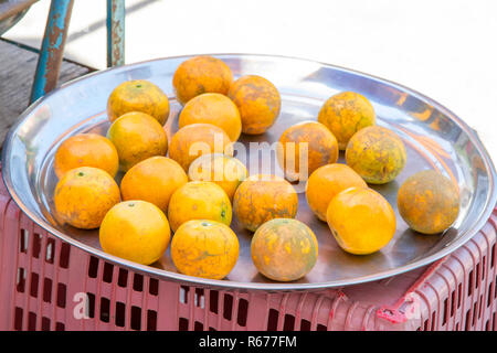 Orange in the tray stainless steel on street food Stock Photo