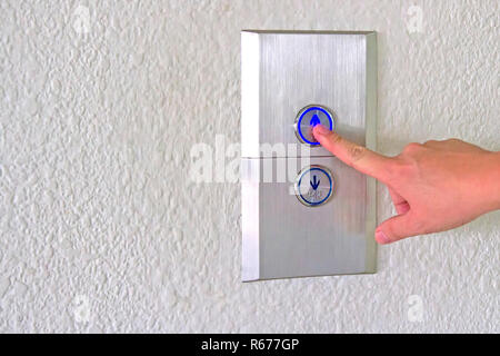Push the elevator button up Stock Photo