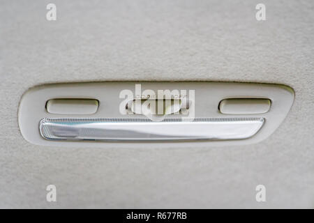Switch lights in the cabin color cream. Stock Photo