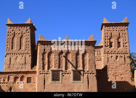 Morocco, Ouarzazate, Skoura, Amridil Kasbah Towers decorated with Berber geometrical symbols. The kasbah is depicted in Morocco's 50 Dirham banknotes. Stock Photo