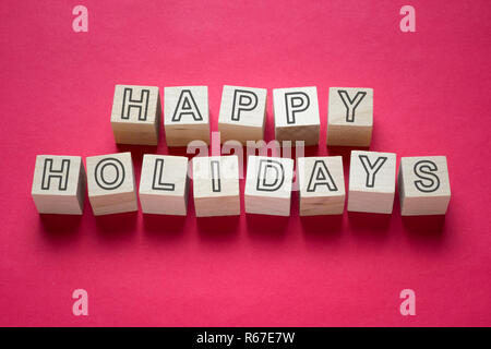 Happy Holidays word on wooden cubes Stock Photo