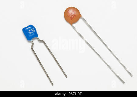 electronic capacitors on a white surface Stock Photo