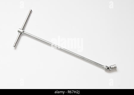 A wrench on a white surface Stock Photo