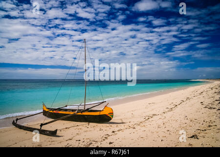Traditional pirogue on the shore Stock Photo
