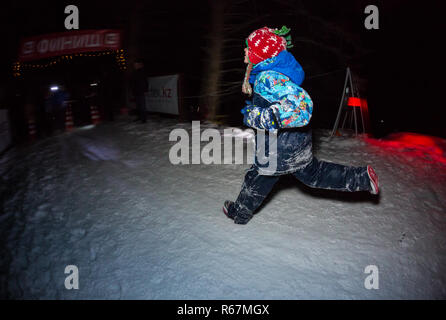 ALMATY, KAZAKHSTAN - 18 FEBRUARY 2017: Night competitions in the foothills of the city of Almaty, in the Trailrunning and Skyship discipline, which is Stock Photo