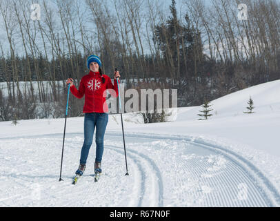 ALMATY, KAZAKHSTAN - FEBRUARY 18, 2017: amateur competitions in the discipline of cross-country skiing, under the name of ARBA Ski Fest. Woman cross c Stock Photo