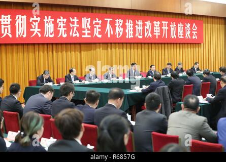 Beijing, China. 4th Dec, 2018. Li Zhanshu, a member of the Standing Committee of the Political Bureau of the Communist Party of China (CPC) Central Committee and chairman of the National People's Congress (NPC) Standing Committee, speaks at a symposium on how to thoroughly study and implement the Constitution and unswervingly advance reform and opening-up in Beijing, capital of China, Dec. 4, 2018. Credit: Liu Weibing/Xinhua/Alamy Live News Stock Photo