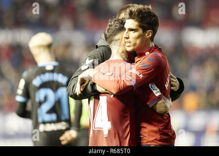 Pamplona, Navarra, Spain. 2nd Dec, 2018. Ruben GarcÃ-a (midfield; CA Osasuna) and Nacho Vidal (defender; CA Osasuna) are seen embracing after the Spanish La Liga 123 football march between CA Osasuna and CD Lugo at the Sadar stadium, in Pamplona. Credit: Fernando Pidal/SOPA Images/ZUMA Wire/Alamy Live News Stock Photo