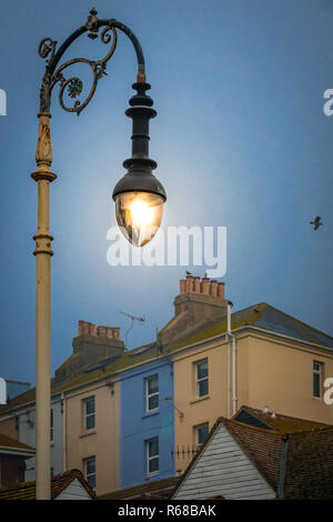 Lamppost and the colorful houses in Hastings Stock Photo