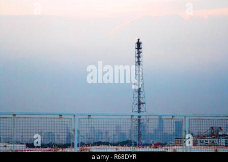 Flue gas in petroleum refinery  on everning Stock Photo