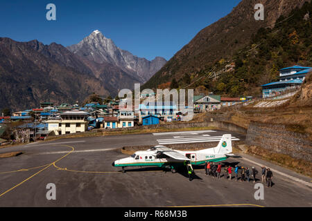 Nepal, Lukla, airport, passengers boarding Tara Air Dornier 228-212 aircraft at world’s most dangerous airport Stock Photo