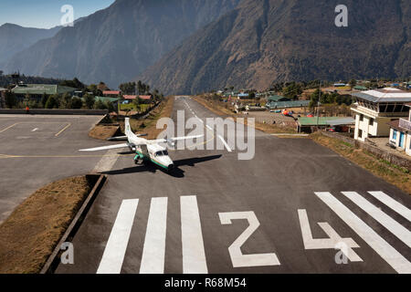Nepal, Lukla, airport, Tara Air Dornier 228-212 aircraft preparing to take off from high altitude runway Stock Photo