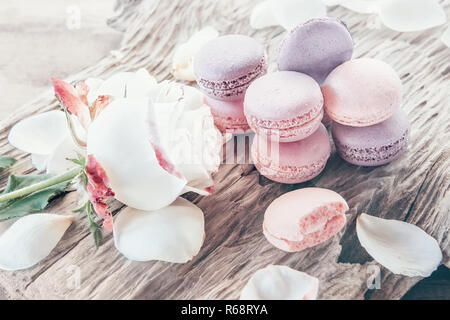 Freshly baked multi-colored macaroons close-up, selective focus. Stock Photo