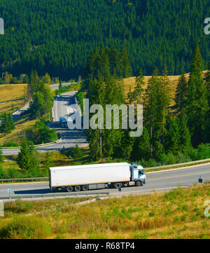 Truck on a mountains road Stock Photo